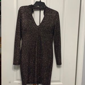 Black form fitting glittery dress